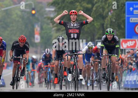 Belgian Zico Waeytens of Team Giant-Alpecin (C) celebrates as he wins before New-Zealand's Daniel McLay of Fortuneo-Vital Concept the sprint at the finish of the final stage of the Baloise Belgium Tour cycling race, 174,2km from Tremelo to Tongeren, on Sunday 29 May 2016.  Stock Photo