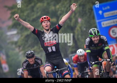 Belgian Zico Waeytens of Team Giant-Alpecin (C) celebrates as he wins before New-Zealand's Daniel McLay of Fortuneo-Vital Concept (R) the sprint at the finish of the final stage of the Baloise Belgium Tour cycling race, 174,2km from Tremelo to Tongeren, on Sunday 29 May 2016.  Stock Photo