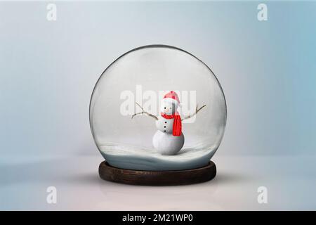 Christmas Holiday background in a snowball. Snowball with christmas on a simple white background. Stock Photo