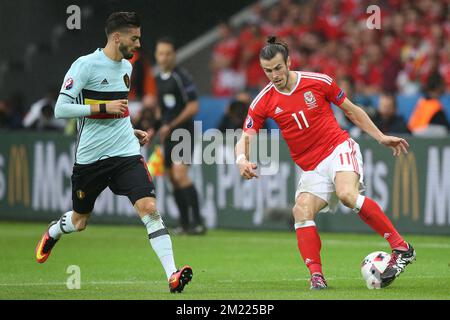 Yannick Carrasco of Belgium, Gareth Bale of Wales during the UEFA EURO 2016 quarter final match between Wales and Belgium on July 2, 2016 at the Stade Pierre Mauroy in Lille, France. Stock Photo