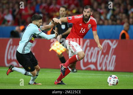 Yannick Carrasco of Belgium, Joe Ledley of Wales during the UEFA EURO 2016 quarter final match between Wales and Belgium on July 2, 2016 at the Stade Pierre Mauroy in Lille, France. Stock Photo