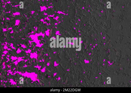 Black painted dark metal surface with old pink purple violet lilac peeling paint pattern wall texture grunge design background. Stock Photo