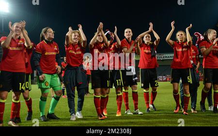 Belgian players celebrate their qualification, despite their 0-2 loss at a Euro2017 qualification match between the Red Flames Belgian national women soccer team, and England, Tuesday 20 September 2016 in Leuven. The Red Flames are already qualified for the Uefa Women's Euro 2017 that will take place from July 16th to August 6th in The Netherlands. BELGA PHOTO DAVID CATRY Stock Photo