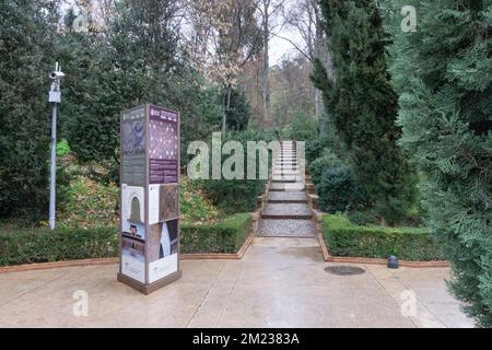 Generalife gardens informatic touristic signs with an antique stairways in sunny day Stock Photo