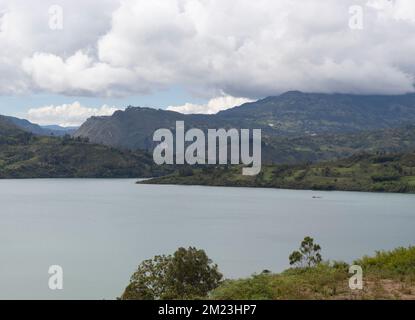 Beautiful colombian blue and reservoir landscape with andean mountain range at background Stock Photo