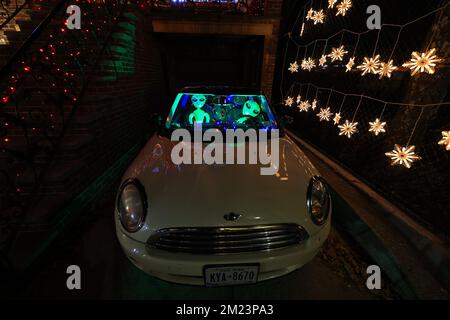 Alens are parked illegally in the driveway of a home in the Dyker Heights section of Brooklyn, New York on Monday, Dec. 12, 2022. (Photo: Gordon Donov Stock Photo
