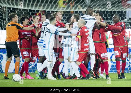 Gent's Kalifa Coulibaly and Oostende's Zarko Tomasevic reacts during a soccer game between KV Oostende and KAA Gent, the quarter-final of the Croky Cup competition, Wednesday 14 December 2016 in Oostende. BELGA PHOTO JASPER JACOBS Stock Photo