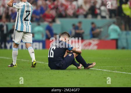 Doha, Qatar, December 13th, 2022, Lusail Iconic Stadium, Doha, QAT, World Cup FIFA 2022, semi-finals, Argentina vs Croatia, in the picture The Croatian team is disappointed after the defeat. Stock Photo