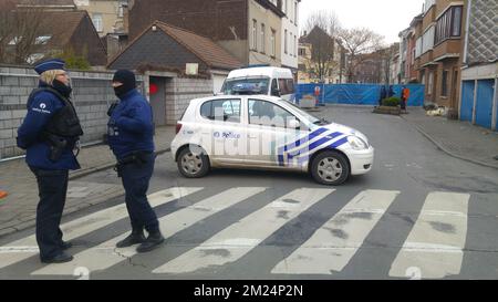 A large security perimeter was set around the Rue Dries - Driesstraat in Forest - Vorst, in Brussels for the reconstruction of the shooting of last year in March 15th, where four police officer were injured and someone was killed, Thursday 26 January 2017. Stock Photo