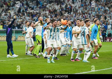DOHA, QATAR - DECEMBER 13: Players of Argentina celebrate the victory after the FIFA World Cup Qatar 2022 Semi-finals match between Argentina and Croatia at Lusail Stadium on December 13, 2022 in Lusail, Qatar. (Photo by Florencia Tan Jun/PxImages) Stock Photo