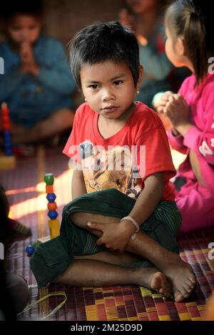 Illustration picture shows kids during a visit to a community based pre-school in Kang Village, Saravane, Laos, Wednesday 22 February 2017. Queen Mathilde, honorary President of Unicef Belgium, is on a four days mission in Laos. BELGA PHOTO YORICK JANSENS  Stock Photo