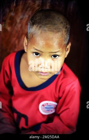 Illustration picture shows a kid during a visit to a community based pre-school in Kang Village, Saravane, Laos, Wednesday 22 February 2017. Queen Mathilde, honorary President of Unicef Belgium, is on a four days mission in Laos. BELGA PHOTO YORICK JANSENS  Stock Photo