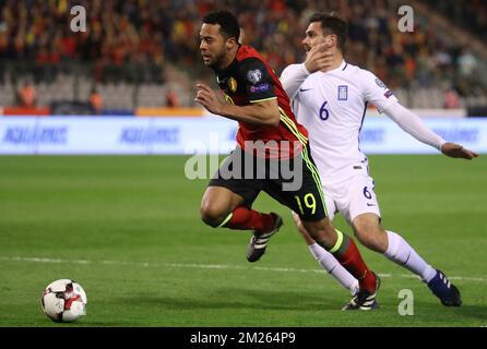 Belgium's Mousa Dembele and Greece's Alexandros Tziolis fight for the ball during a World Cup 2018 qualification game between Belgium's Red Devils and Greece, Saturday 25 March 2017, at the King Baudouin stadium in Brussels. BELGA PHOTO VIRGINIE LEFOUR Stock Photo