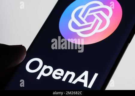 OpenAI logo seen on the screen of smartphone. AI software developer. Stafford, United Kingdom, December 13, 2022. Stock Photo