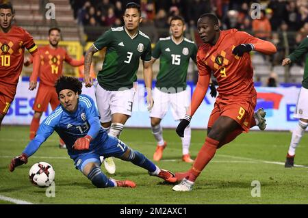 Mexico's goalkeeper Guillermo Ochoa (C) pictured as Belgium's Romelu Lukaku (R) scores the 2-1 goal during a friendly soccer game between Belgian national team Red Devils and Mexico, Friday 10 November 2017, in Brugge. BELGA PHOTO BRUNO FAHY Stock Photo