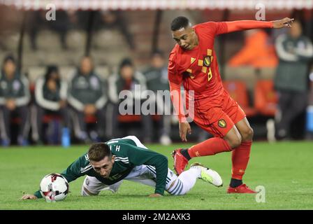 Mexico's Hector Herrera and Belgium's Youri Tielemans fight for the ball during a friendly soccer game between Belgian national team Red Devils and Mexico, Friday 10 November 2017, in Brugge. BELGA PHOTO VIRGINIE LEFOUR Stock Photo