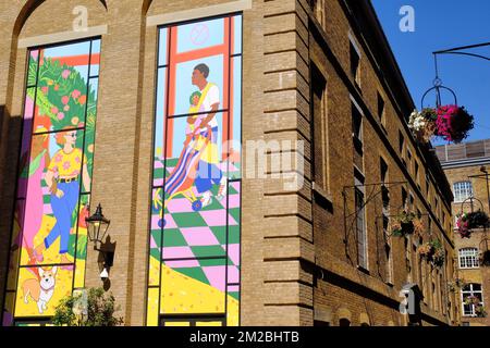 Colourful large murals including a corgi at Langley Street and Mercer Walk, Covent Garden, London, England Stock Photo