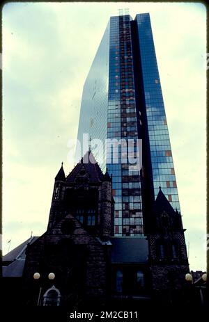 Copley Sq. group - New John Hancock Ins. Co. - Trinity Church toward old John Hancock , Office buildings, Disasters, Windows, John Hancock Tower Boston, Mass.. Photographs by Ernst Halberstadt Stock Photo