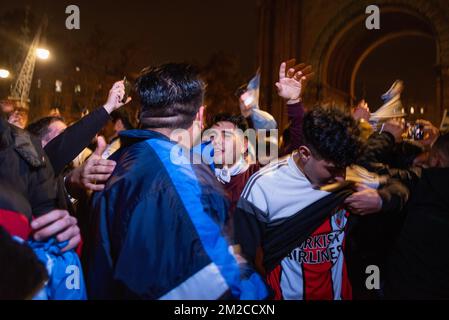 Barcelona, Spain. 13th Dec, 2022. The crowd is seen jumping and chanting during the celebrations for the victory of the Argentina football team over Croatia at the city center after the football match. The Argentinian team, led by Messi, beat Croatia 3-0, qualifying for the finals, for the first time since 2014. (Photo by Davide Bonaldo/SOPA Images/Sipa USA) Credit: Sipa USA/Alamy Live News Stock Photo