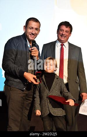 comedian Dany Boon (Daniel Hamidou), Tournai acting mayor Paul-Olivier Delannois and his son pictured during a ceremony to award the Tournai 'citoyen d'honneur' (honorary citizen - ereburgerschap) to French filmmaker Boon, Monday 12 February 2018 in Tournai. Daniel Hamidou aka Dany Boon is a comedian, director, actor and writer, most famous for his 2008 film 'Bienvenue chez les Ch'tis'. BELGA PHOTO CAMILLE DELANNOIS Stock Photo