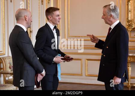 Corne Lepoetre, President ad interim Belgian Royal Speed Skating Federation, Belgian speed skater Bart Swings and King Philippe - Filip of Belgium pictured during an Audience at the Royal Palace in Brussels, Monday 05 March 2018. Two weeks ago Belgian speed skater Swings won a silver medal in the men's mass start speed skating event at the XXIII Olympic Winter Games in Pyeongchang County, South Korea. BELGA PHOTO DIRK WAEM Stock Photo