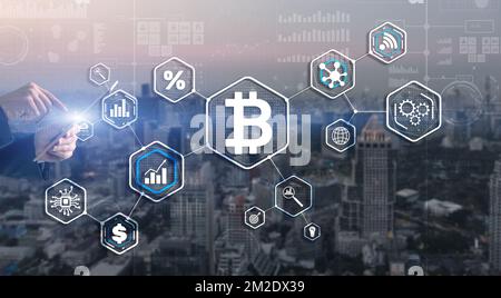 Man clicks on a virtual screen bitcoin icon Stock Photo