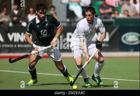 Waterloo Ducks' Luca Masso and Racing's Jerome Truyens fight for the ball during a hockey game between Waterloo Ducks and Racing, in the Audi league hockey competition, Sunday 08 April 2018, in Waterloo. BELGA PHOTO VIRGINIE LEFOUR Stock Photo