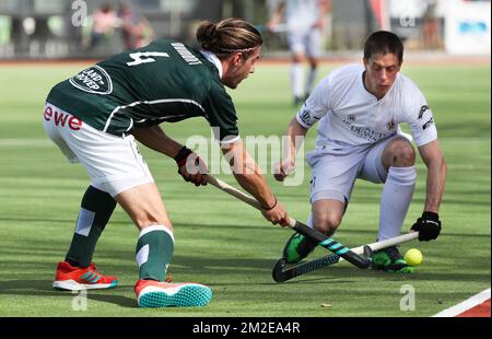 Waterloo Ducks' Nicolas Dumont and Racing's Jerome Truyens fight for the ball during a hockey game between Waterloo Ducks and Racing, in the Audi league hockey competition, Sunday 08 April 2018, in Waterloo. BELGA PHOTO VIRGINIE LEFOUR Stock Photo