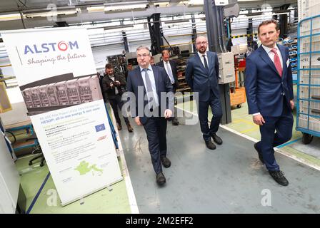 Walloon vice-minister president and minister of Economy, Employment and Formation Pierre-Yves Jeholet and Belgian Prime Minister Charles Michel pictured during a visit to the Alstom transport materials producer in Charleroi, Tuesday 17 April 2018. BELGA PHOTO VIRGINIE LEFOUR Stock Photo