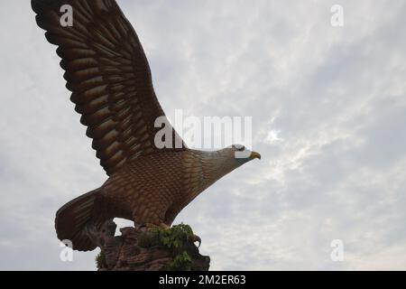 Langkawi, Malaysia - December 12, 2022: The Eagle of Langkawi. Landmark of the Malaysian Island. Huge statue of an eagle at the Eagle Square near the Stock Photo