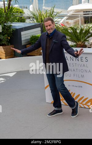 John Travolta attends for the 'Rendezvous With John Travolta - Gotti' Photocall during the 71st annual Cannes Film Festival at Palais des Festivals | John Travolta assiste au photocall 'Rendez-vous avec John Travolta - Gotti' lors de la 71ème édition du Festival de Cannes au Palais des Festivals. 14/05/2018 Stock Photo