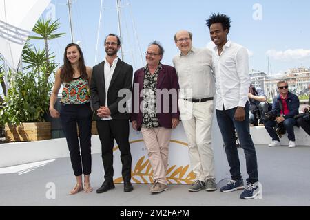 Michel TOESCA, Cedric Herrou and guests attends the 'Libre' Photocall during the 71st annual Cannes Film Festival at Palais des Festivals | Michel TOESCA, Cedric Herrou et des invités assistent au Photocall de 'Libre' lors du 71ème Festival de Cannes au Palais des Festivals. 18/05/2018 Stock Photo