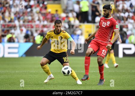 Belgium's Eden Hazard and Tunesia's Ferjani Sassi fight for the ball during the second game of Belgian national soccer team the Red Devils against Tunisia national team in the Spartak stadium, in Moscow, Russia, Saturday 23 June 2018. Belgium won its first group phase game. BELGA PHOTO DIRK WAEM Stock Photo
