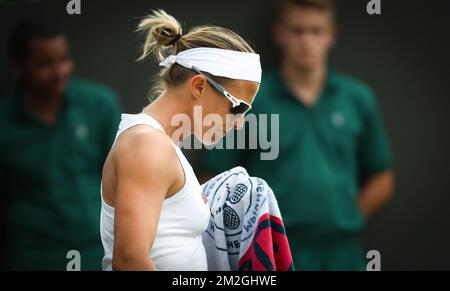 Belgian Kirsten Flipkens looks dejected during a tennis match between Belgian Kirsten Flipkens (WTA 45) and Latvian Jelena Ostapenko (WTA 12), in the second round of the ladies singles at the 2018 Wimbledon grand slam tennis tournament at the All England Tennis Club, in south-west London, Britain, Thursday 05 July 2018. BELGA PHOTO VIRGINIE LEFOUR Stock Photo