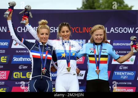 French Pauline Ferrand-Prevot, Swiss Jolanda Neff and Belgian mountain biker Githa Michiels celebrate on the podium after the women's cross country cycling event at the European Championships, in Glasgow, Scotland, Tuesday 07 August 2018. European championships of several sports will be held in Glasgow from 03 to 12 August. BELGA PHOTO BELGA  Stock Photo