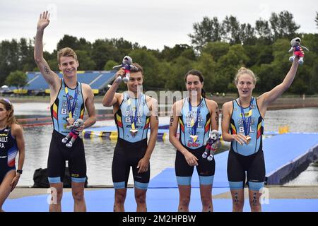 Belgian triathlete Marten Van Riel , Belgian triathlete Jelle Geens, Belgian triathlete Claire Michel and Belgian triathlete Valerie Barthelemy celebrate with the bronze medal at the Mixed Team Relay triathlon event at the European Championships, in Glasgow, Scotland, Saturday 11 August 2018. European championships of several sports will be held in Glasgow from 03 to 12 August. BELGA PHOTO ERIC LALMAND  Stock Photo