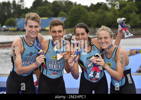 Belgian triathlete Marten Van Riel , Belgian triathlete Jelle Geens, Belgian triathlete Claire Michel and Belgian triathlete Valerie Barthelemy celebrate with the bronze medal at the Mixed Team Relay triathlon event at the European Championships, in Glasgow, Scotland, Saturday 11 August 2018. European championships of several sports will be held in Glasgow from 03 to 12 August. BELGA PHOTO ERIC LALMAND  Stock Photo