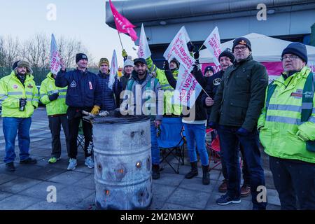 Leeds, UK. 14th December 2022. Royal Mail postal workers and postmen at picket line on strike at Leeds Mail Centre. CWU Communication Workers Union taking industrial action over pay. Credit: Bradley Taylor / Alamy Live News Stock Photo