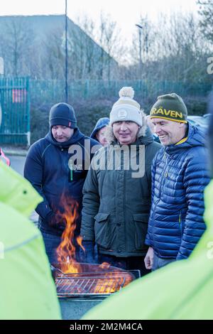 Leeds, UK. 14th December 2022. Royal Mail postal workers and postmen at picket line on strike at Leeds Mail Centre. CWU Communication Workers Union taking industrial action over pay. Credit: Bradley Taylor / Alamy Live News Stock Photo