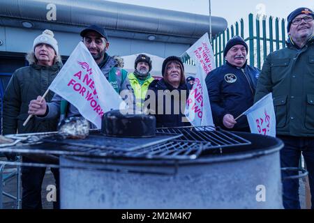 Leeds, UK. 14th December 2022. Royal Mail postal workers and postmen at picket line on strike at Leeds Mail Centre. CWU Communication Workers Union taking industrial action over pay. Credit: Bradley Taylor / Alamy Live News Stock Photo