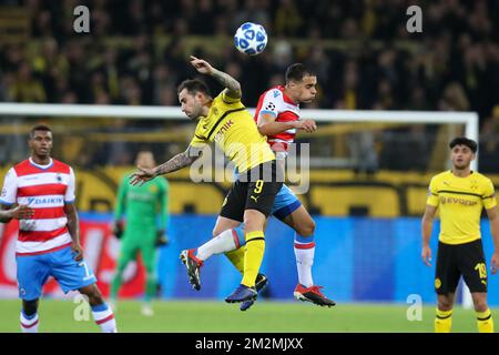 Dortmund's Paco Alcacer and Club's Sofyan Amrabat fight for the ball during a game between Belgian soccer team Club Brugge KV and German team Borussia Dortmund in Dortmund, Germany, Wednesday 28 November 2018, on the fifth day of the UEFA Champions League, in group A. BELGA PHOTO BRUNO FAHY Stock Photo