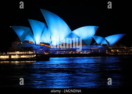 Sydney, Australia. 14th December 2022. Sydney Opera House was illuminated in blue to pay tribute to the two police officers Constable Matthew Arnold and Constable Rachel McCrow were shot dead in the line of duty at Wieambilla in the Western Downs on Tuesday. Credit: Richard Milnes/Alamy Live News Stock Photo