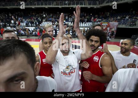 Oostende's Dusan Djordjevic (C) celebrates with teammates after winning the basketball match between Antwerp Giants and Filou Oostende, Saturday 12 January 2019 in Antwerp, on day 13 of the 'EuroMillions League' Belgian first division basket competition. BELGA PHOTO KRISTOF VAN ACCOM Stock Photo