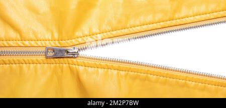 Yellow leather texture and open metal zipper isolated on white background. Business background, banner, header, mockup with copy space. Top view, flat Stock Photo