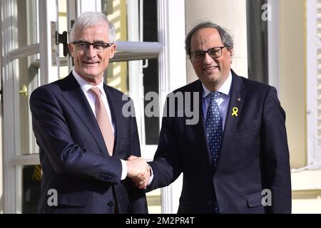 Flemish Minister-President Geert Bourgeois and Catalan Minister-President Quim Torra shake hands before a meeting between Flemish Minister-President Bourgeois with his Catalan counterpart Quim Torra, in Brussels, Monday 18 February 2019. BELGA PHOTO LAURIE DIEFFEMBACQ  Stock Photo