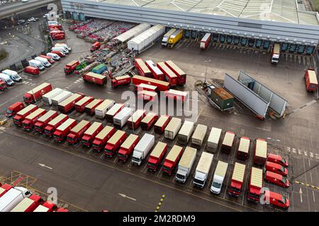 Royal Mail delivery vehicles and cages of mail at the Bristol Filton office. Picture date: Wednesday December 14, 2022. Stock Photo