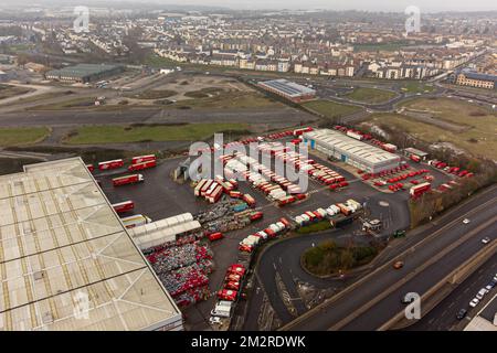 Royal Mail delivery vehicles and cages of mail at the Bristol Filton office. Picture date: Wednesday December 14, 2022. Stock Photo