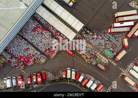 Royal Mail delivery vehicles and cages of mail at the Bristol Filton office. Picture date: Wednesday December 14, 2022. Stock Photo