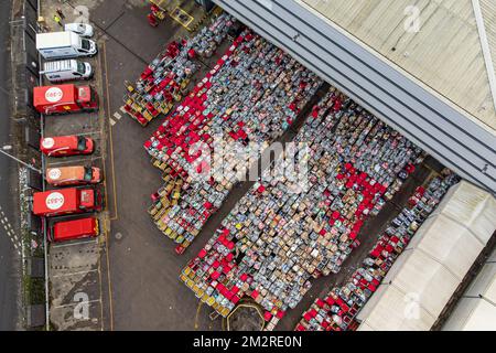 Royal Mail delivery vehicles and cages of mail at the Bristol Filton office. Picture date: Wednesday December 14, 2022. Stock Photo