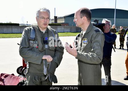 Vice-Prime Minister and Minister of Foreign Affairs and Defence Didier Reynders and head of Belgian Air Force General Major Frederik Vansina pictured during a visit by Defence minister Reynders to the military airbase of Florennes, Thursday 18 April 2019. BELGA PHOTO ERIC LALMAND Stock Photo